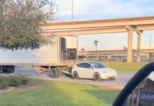 Tesla Model Y была замечена буксирующей полноразмерный тягач с прицепом
